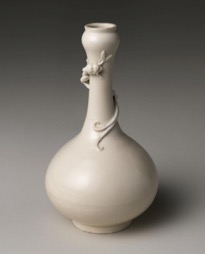 Un florero de cerámica
El contenido generado por IA puede ser incorrecto.